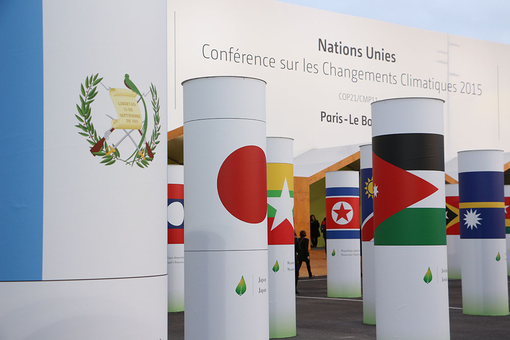 Flag forest in front of the entrance of COP21/CMP11 